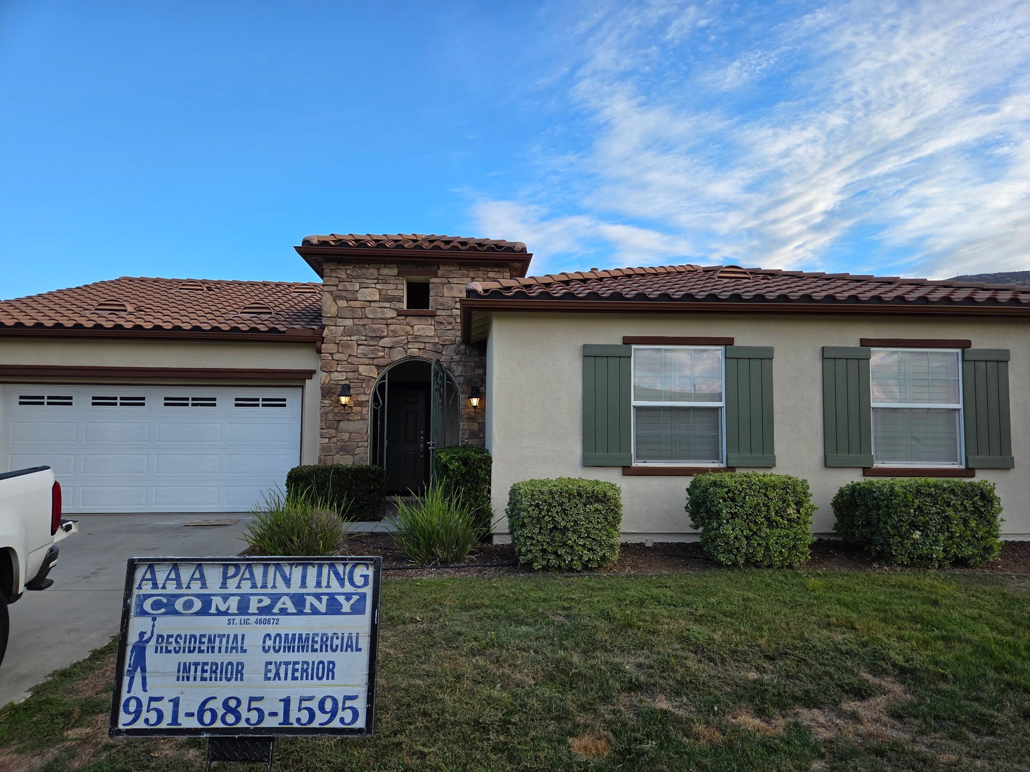 AAA Painting Company yard sign at a finished Mediterranean style exterior repaint in the Inland Empire, CA